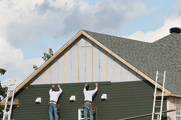 Professional Siding Installation technician working in Marlboro, NJ